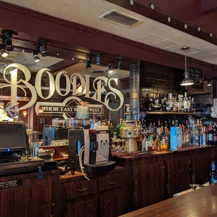 a bar with a television in the background