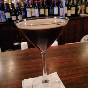 Joe makes a scrumptious espresso martini with coffee beans afloat!