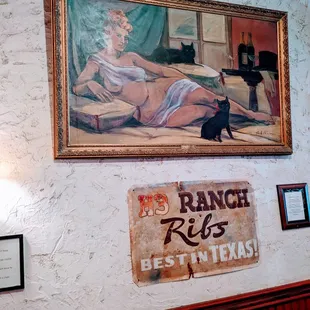 a painting of a woman and a cat