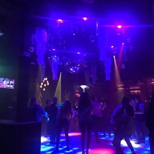 people dancing on the dance floor
