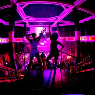 two people dancing in a club