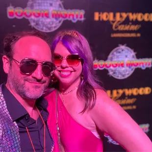 a man and a woman posing for a picture