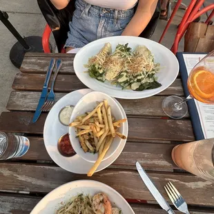 Shrimp scampi, fries and Caesar salad