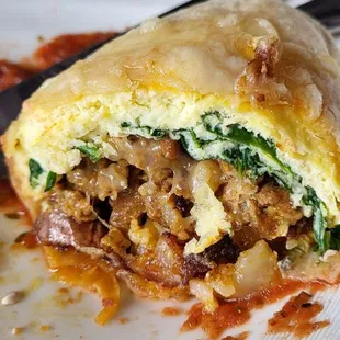 a half eaten breakfast sandwich