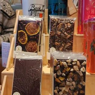 Fascinating artisan chocolate bars by the register (Wildwood Chocolates, 12/19/23)