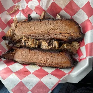 a pulled pork sandwich in a basket
