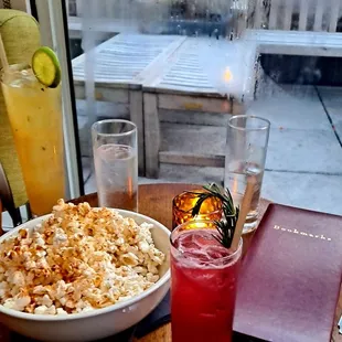 Truffle popcorn, Tea S. Eliot, and mocktail