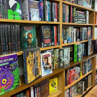 We have a growing selection of new books specializing in sci-fi, fantasy, mystery, horror, RPG, Manga, and graphic novels.