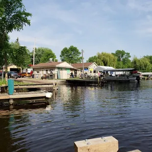 a view of a dock with a block of wood in the foreground