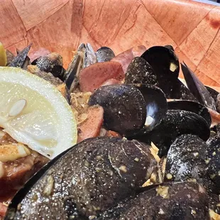 a bowl of mussels and clams