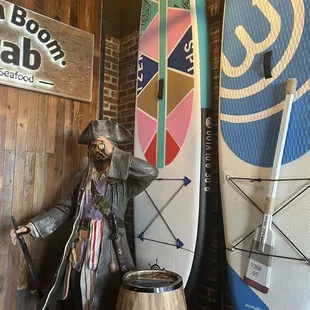 a statue of a man dressed as a pirate