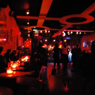 a crowd of people at a bar