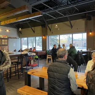 a group of people sitting at tables