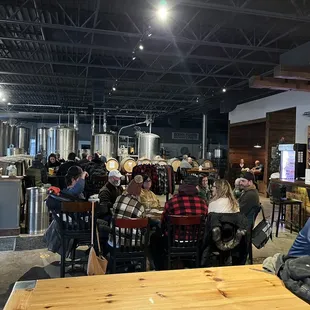 a crowd of people sitting at tables