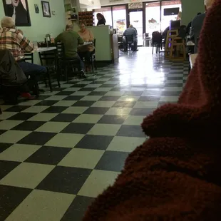 Small place. We are sitting in the back.