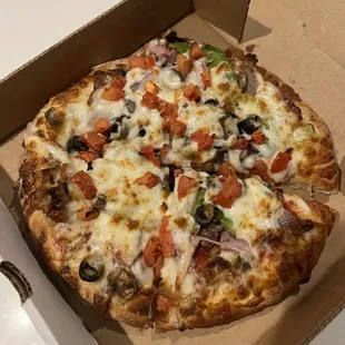 Individual pizza. 6" $18 with tax and tip. So small. Such eh quality products. The bread was chewy.