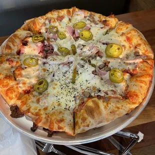Medium All The Meats Pizza with jalapeños added, it was excellent