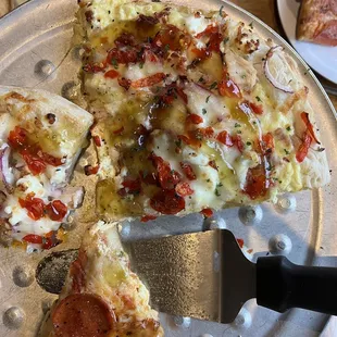 More like snot on my pizza than an award winning recipe....only 4 seated tables in the restaurant, still took 40min to get served.