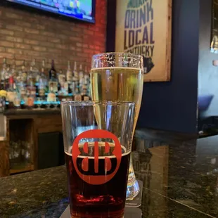 a glass of beer and a drink