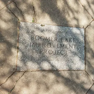 Some plaques in the sidewalks.