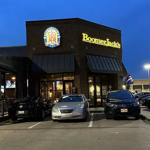 cars parked in front of the restaurant