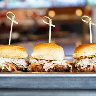 three sliders on a tray