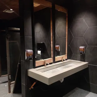 a bathroom with two sinks