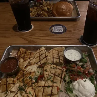 Chicken fajita quesadilla, and hamburger with fries