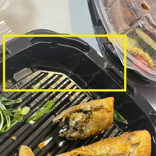 Long piece of hair removed from my mouth after taking a bite of the southwest egg rolls
