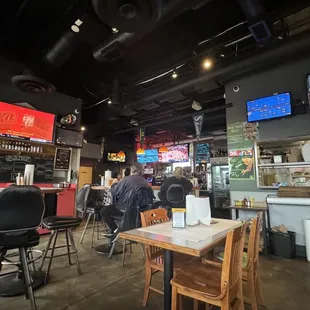 Interior seating, tv&apos;s and bar