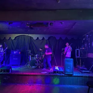 a band performing on stage