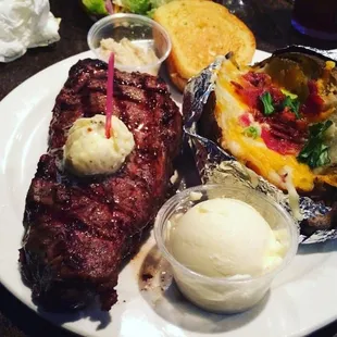 NY Strip with a loaded baked potato