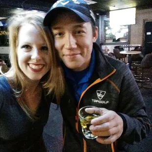 a man and a woman taking a selfie