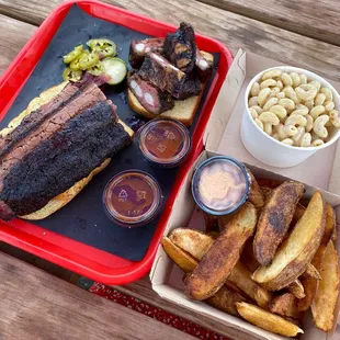 Brisket, rib tips, mac n cheese, potato wedges.