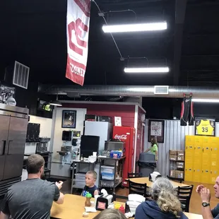 Coke machine and restroom.