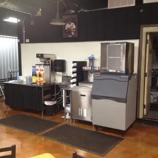 a kitchen with a refrigerator and a counter