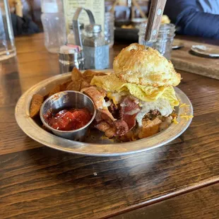 Yukon Chicken Biscuit sandwich add egg and a side of potato's