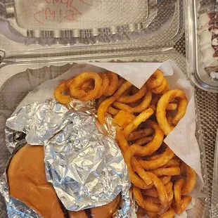 Swiss burger with curly fries