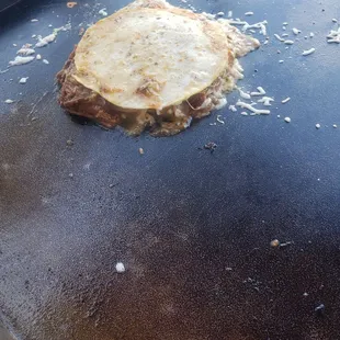 a pizza on a grill