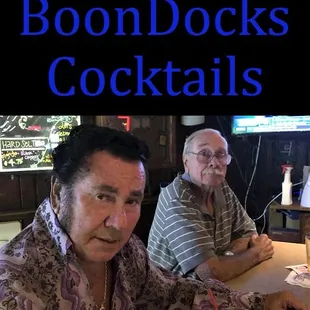 two men sitting at a table