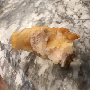 Whats in this photo? Raw chicken and dough