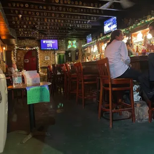 a man sitting at a bar