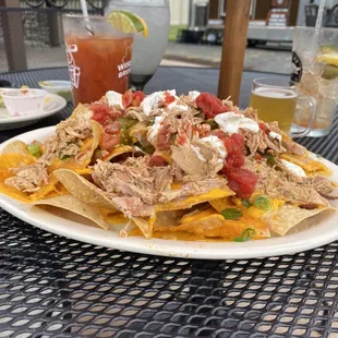 Loaded smoked chicken nachos.