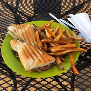 a plate of fries and a sandwich