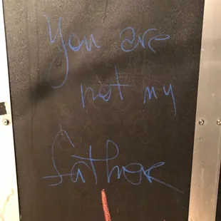 you are not my father written on a blackboard