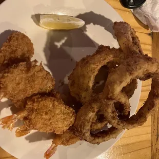 "Jumbo Shrimp" baked potatoes weren't ready so we got onion rings instead