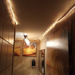 a sink in a dimly lit bathroom