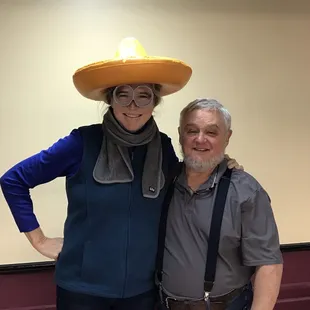a man and woman posing for a picture