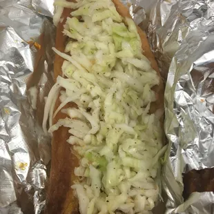 All beef hot dog with their homemade slaw &amp; homemade chili.