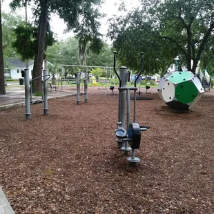 Playground with adult exercise toys.